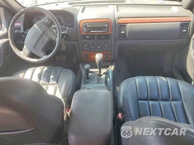 Zdjęcie 8 z 13 samochodu: 1999 JEEP GRAND CHEROKEE LIMITED VIN:1J4GW68N4XC695246 - miniatura
