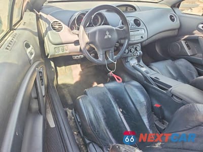 Zdjęcie 8 z 12 samochodu: 2011 MITSUBISHI ECLIPSE SPYDER GS VIN:4A37L5EF1BE004609 - miniatura