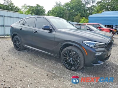 Czwarte zdjęcie samochodu z boku: 2021 BMW X6 SDRIVE 40I VIN:5UXCY4C02M9F23872 - miniatura