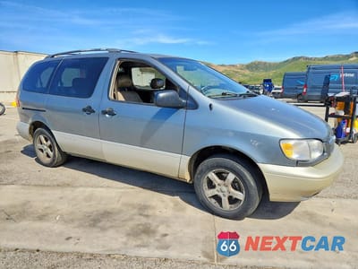 Czwarte zdjęcie samochodu z boku: 1999 TOYOTA SIENNA XLE VIN:4T3ZF13C9XU150020 - miniatura