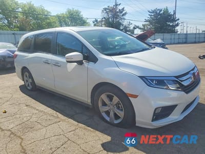 Czwarte zdjęcie samochodu z boku: 2020 HONDA ODYSSEY EXL VIN:5FNRL6H7XLB064054 - miniatura