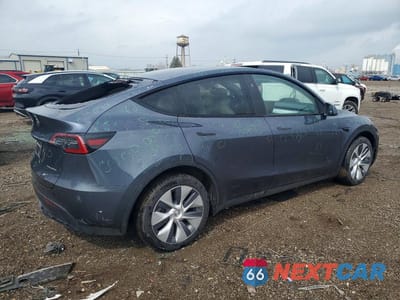 Trzecie zdjęcie samochodu z tyłu: 2023 TESLA MODEL Y VIN:7SAYGDEE7PA195326 - miniatura