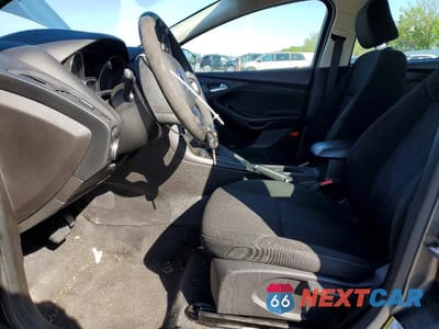 Zdjęcie 7 z 12 samochodu: 2016 FORD FOCUS SE VIN:1FADP3F2XGL382494 - miniatura