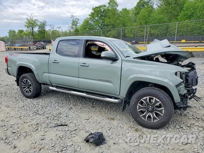 Czwarte zdjęcie samochodu z boku: 2023 TOYOTA TACOMA TRD SPORT VIN:3TMDZ5BN9PM148233 - miniatura