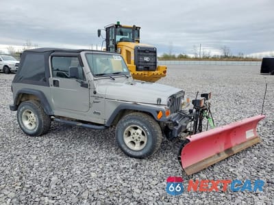 Czwarte zdjęcie samochodu z boku: 2000 JEEP WRANGLER / TJ SPORT VIN:1J4FA49S0YP729650 - miniatura