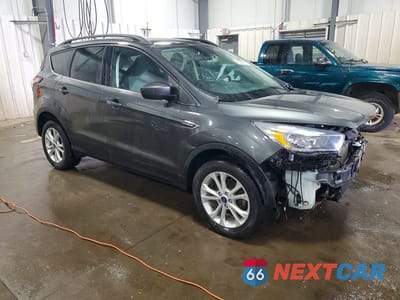 Czwarte zdjęcie samochodu z boku: 2018 FORD ESCAPE SE VIN:1FMCU0GDXJUC69221 - miniatura