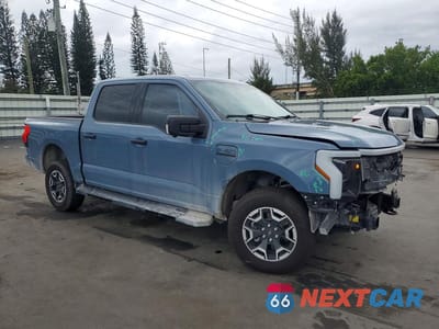Czwarte zdjęcie samochodu z boku: 2023 FORD F150 LIGHTNING XLT VIN:1FTVW1EL6PWG12773 - miniatura