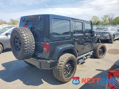 Trzecie zdjęcie samochodu z tyłu: 2010 JEEP WRANGLER UNLIMITED SPORT VIN:1J4BA3H11AL119996 - miniatura