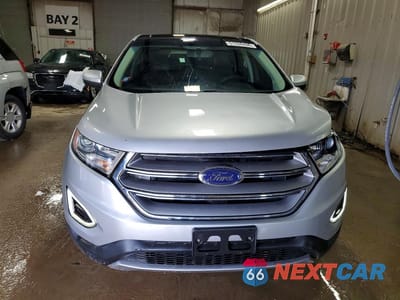 Piąte zdjęcie samochodu w środku: 2017 FORD EDGE TITANIUM VIN:2FMPK4K91HBB90313 - miniatura