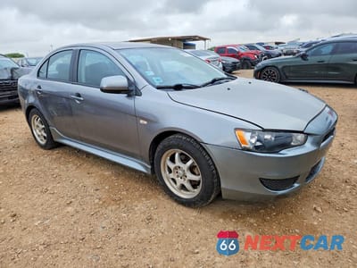 Czwarte zdjęcie samochodu z boku: 2014 MITSUBISHI LANCER ES VIN:JA32U2FU8EU004024 - miniatura