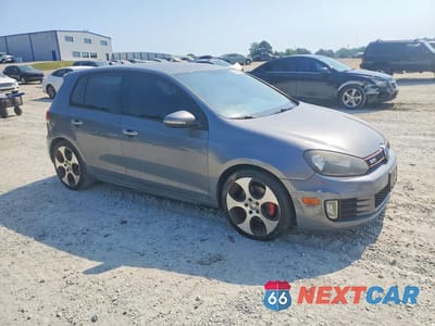 Czwarte zdjęcie samochodu z boku: 2011 VOLKSWAGEN GTI VIN:WVWHD7AJ6BW139489 - miniatura