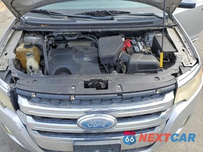 Zdjęcie 12 z 13 samochodu: 2011 FORD EDGE SEL VIN:2FMDK3JC9BBB35447 - miniatura