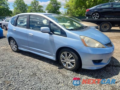 Czwarte zdjęcie samochodu z boku: 2009 HONDA FIT SPORT VIN:JHMGE88479S041733 - miniatura