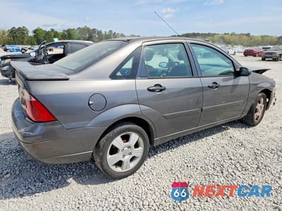Trzecie zdjęcie samochodu z tyłu: 2005 FORD FOCUS ZX4 VIN:1FAFP34NX5W269176 - miniatura