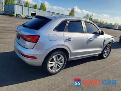Trzecie zdjęcie samochodu z tyłu: 2018 AUDI Q3 PREMIUM VIN:WA1BCCFS6JR016236 - miniatura
