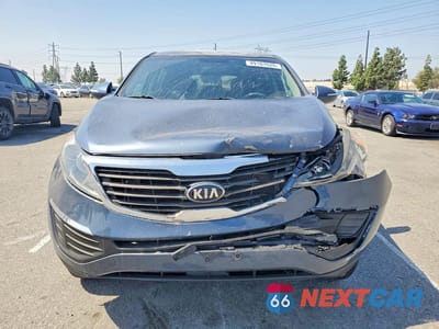 Piąte zdjęcie samochodu w środku: 2013 KIA SPORTAGE LX VIN:KNDPB3A25D7500372 - miniatura