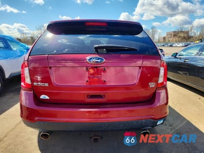 Zdjęcie 6 z 11 samochodu: 2013 FORD EDGE SEL VIN:2FMDK4JC0DBA39604 - miniatura