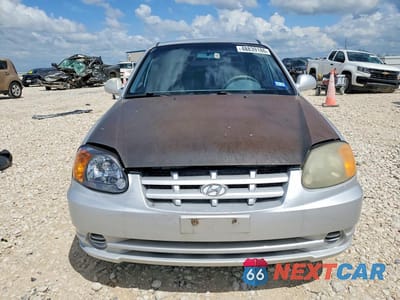 Piąte zdjęcie samochodu w środku: 2005 HYUNDAI ACCENT GLS VIN:KMHCG45C95U632977 - miniatura