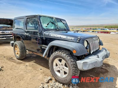 Czwarte zdjęcie samochodu z boku: 2012 JEEP WRANGLER SPORT VIN:1C4AJWAG9CL270587 - miniatura