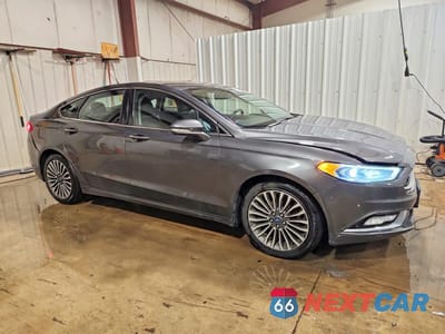 Czwarte zdjęcie samochodu z boku: 2017 FORD FUSION SE VIN:3FA6P0H96HR111887 - miniatura