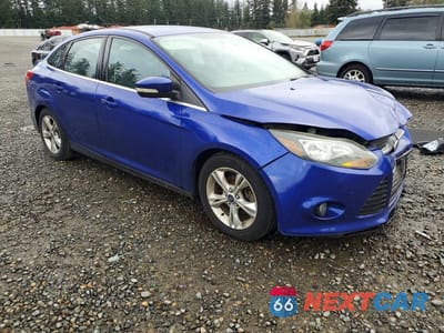 Czwarte zdjęcie samochodu z boku: 2014 FORD FOCUS TITANIUM VIN:1FADP3J20EL230468 - miniatura