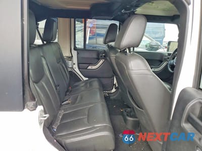 Zdjęcie 10 z 11 samochodu: 2017 JEEP WRANGLER UNLIMITED SAHARA VIN:1C4BJWEG3HL582040 - miniatura