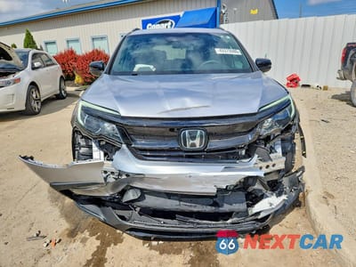 Piąte zdjęcie samochodu w środku: 2022 HONDA PILOT SPORT VIN:5FNYF5H35NB006981 - miniatura