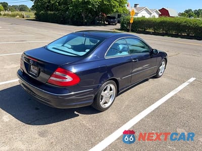Czwarte zdjęcie samochodu z boku: 2003 MERCEDES-BENZ CLK 500 VIN:WDBTJ75J93F056586 - miniatura