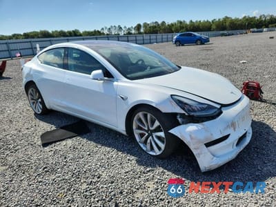 Czwarte zdjęcie samochodu z boku: 2018 TESLA MODEL 3 VIN:5YJ3E1EB9JF084465 - miniatura