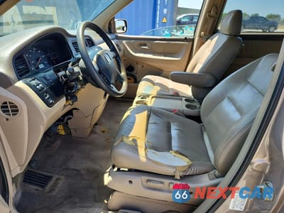 Zdjęcie 7 z 14 samochodu: 2003 HONDA ODYSSEY EXL VIN:5FNRL18993B041451 - miniatura
