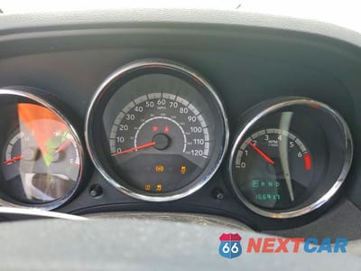 Zdjęcie 9 z 12 samochodu: 2010 DODGE CALIBER MAINSTREET VIN:1B3CB3HA9AD568099 - miniatura