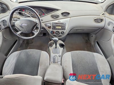 Zdjęcie 8 z 12 samochodu: 2002 FORD FOCUS ZX5 VIN:3FAHP373X2R192018 - miniatura