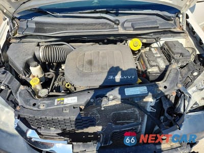 Zdjęcie 12 z 13 samochodu: 2013 DODGE GRAND CARAVAN SXT VIN:2C4RDGCGXDR759277 - miniatura