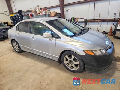 Czwarte zdjęcie samochodu z boku: 2007 HONDA CIVIC LX VIN:2HGFA16527H013565 - miniatura