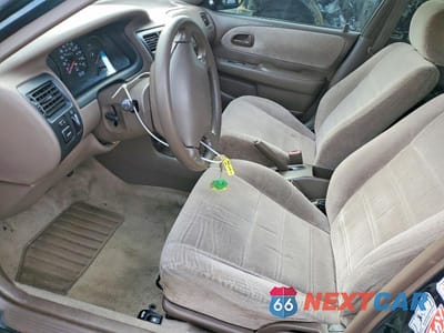 Zdjęcie 7 z 12 samochodu: 1997 TOYOTA COROLLA DX VIN:1NXBB02E5VZ588419 - miniatura