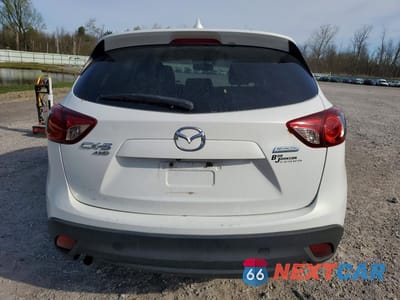 Zdjęcie 6 z 13 samochodu: 2013 MAZDA CX-5 TOURING VIN:JM3KE4CE8D0141372 - miniatura