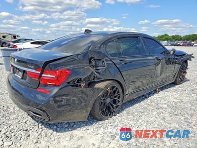 Trzecie zdjęcie samochodu z tyłu: 2019 BMW 740 I VIN:WBA7E2C55KB454770 - miniatura