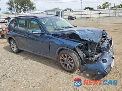 Czwarte zdjęcie samochodu z boku: 2014 BMW X1 XDRIVE28I VIN:WBAVL1C54EVY22057 - miniatura