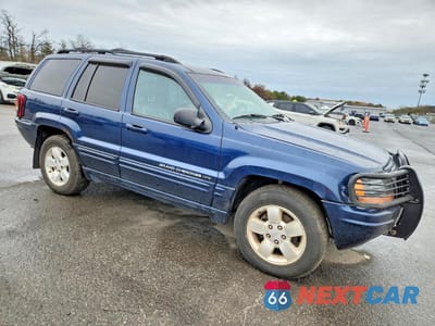 Czwarte zdjęcie samochodu z boku: 2001 JEEP GRAND CHEROKEE LIMITED VIN:1J4GW58SX1C578326 - miniatura
