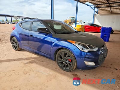 Czwarte zdjęcie samochodu z boku: 2017 HYUNDAI VELOSTER BASE VIN:KMHTC6AD4HU311553 - miniatura