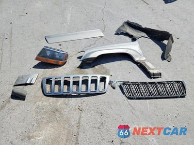 Zdjęcie 13 z 14 samochodu: 2002 JEEP GRAND CHEROKEE OVERLAND VIN:1J8GW68J12C183285 - miniatura