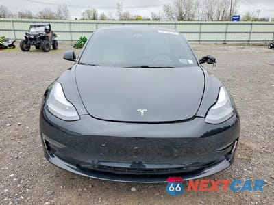 Piąte zdjęcie samochodu w środku: 2021 TESLA MODEL 3 VIN:5YJ3E1EB1MF064246 - miniatura