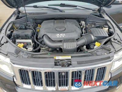 Zdjęcie 12 z 13 samochodu: 2012 JEEP GRAND CHEROKEE LAREDO VIN:1C4RJFAG5CC221485 - miniatura