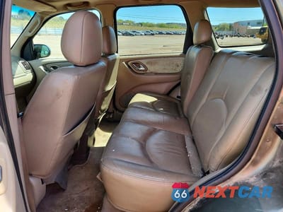 Zdjęcie 10 z 12 samochodu: 2002 MAZDA TRIBUTE LX VIN:4F2YU08142KM07136 - miniatura