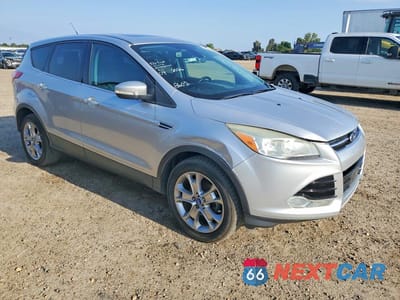 Czwarte zdjęcie samochodu z boku: 2013 FORD ESCAPE SEL VIN:1FMCU0HX0DUB08602 - miniatura