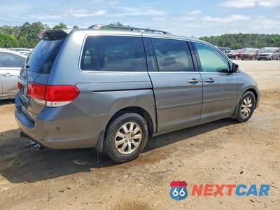 Trzecie zdjęcie samochodu z tyłu: 2010 HONDA ODYSSEY EXL VIN:5FNRL3H73AB018769 - miniatura