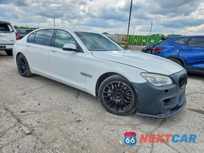 Czwarte zdjęcie samochodu z boku: 2015 BMW 750 LI VIN:WBAYE8C55FD781476 - miniatura