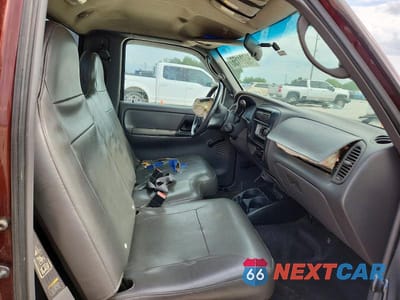 Zdjęcie 10 z 12 samochodu: 2003 MAZDA B2300 VIN:4F4YR12D03TM14050 - miniatura
