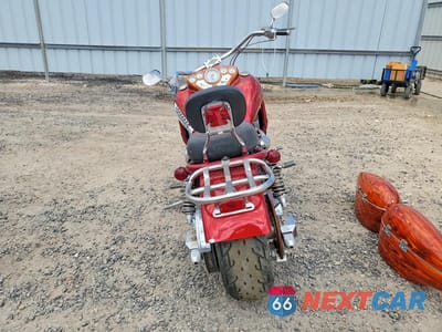 Czwarte zdjęcie samochodu z boku: 1997 BOSS MOTORCYCLE VIN:1B9TBVC28VD285166 - miniatura