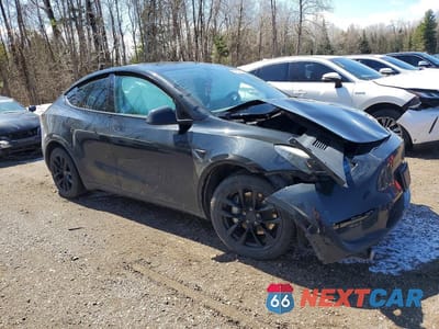 Czwarte zdjęcie samochodu z boku: 2023 TESLA MODEL Y VIN:LRWYGDEEXPC266657 - miniatura